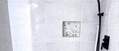Shower, hair dryer, soap, shampoo
