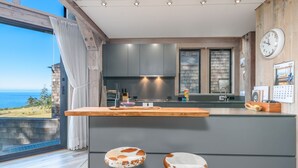 Casa de campo, 1 cama King size y sofá cama, acceso a la alberca, vista al océano | Restaurantes