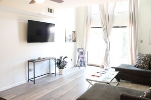 Condo, 1 Queen Bed, Patio | Living area | TV - Louisiana Style (Little Rock)