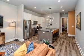 House, Multiple Beds, Balcony, City View | Living area | TV