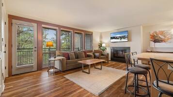 Condo, Multiple Beds, Balcony, Garden View (Cascade Mountain Oasis) | Living area | TV, fireplace