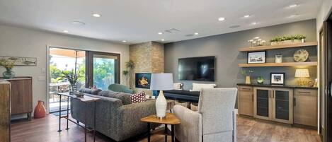 House, Multiple Beds, Patio, Garden View (Cozy Contemporary) | Living area | 50-inch flat-screen TV with digital channels, fireplace