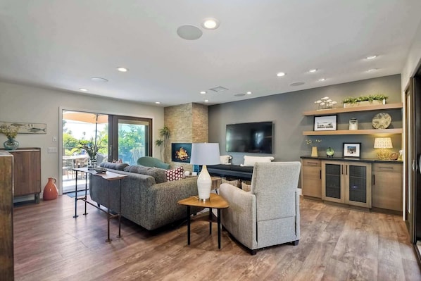 House, Multiple Beds, Patio, Garden View (Cozy Contemporary) | Living area | 50-inch flat-screen TV with digital channels, fireplace