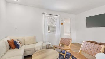 Cabin, Multiple Beds, Patio, Garden View (Tranquil Woods Retreat Branson) | Living area | 42-inch flat-screen TV with digital channels