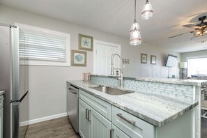 Condo, Multiple Beds, Balcony, Partial Ocean View (Beachin Rides) | Private kitchen | Fridge, microwave, oven, stovetop