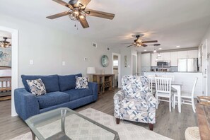 Condo, Multiple Beds, Balcony, Partial Ocean View (Beachin Rides) | Living area | 42-inch flat-screen TV with digital channels