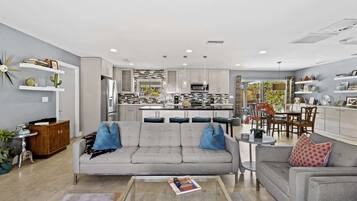 House, Multiple Beds, Pool Access, Pool View (Tiki Time Getaway) | Living area | 50-inch flat-screen TV with digital channels, fireplace