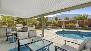 Outdoor pool, pool umbrellas, pool loungers