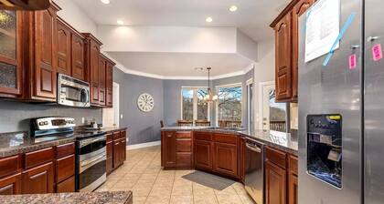 5-Bedrooms on the water! 2 Kitchens, Hot Tub, and Theatre!