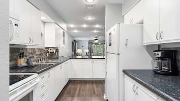 Condo, Multiple Beds, Balcony, Garden View (Dora) | Private kitchen | Coffee/tea maker