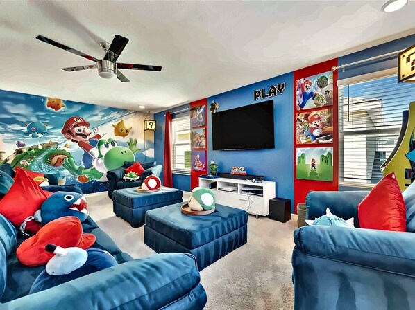 Level up your stay in our Mario Game Room! Bright, bold, and packed with arcade - 7BR Disney Villa - Heated Pool + Cinema + Game Rm + SpiderVerse Room (Four Corners)