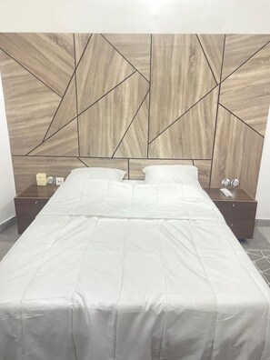 2 habitaciones, tabla de planchar con plancha, wifi y ropa de cama 