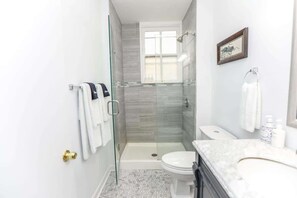 Shower, hair dryer, towels