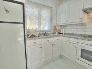 Fridge, oven, coffee/tea maker, toaster