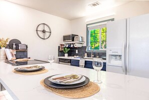 Fridge, dishwasher, coffee/tea maker, high chair