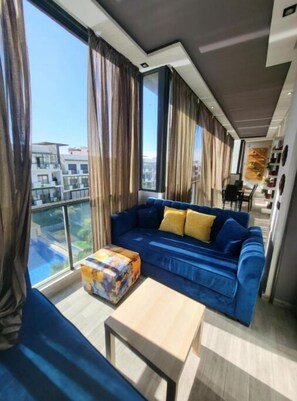 Living area - Magnifique Appartement vue Piscines, Fontaines et Espaces Verts Ensoleillé (Tamaris)