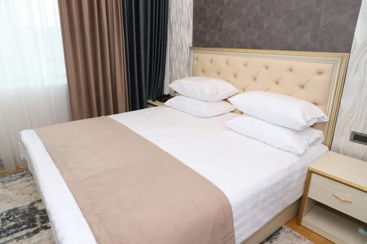 1 bilik tidur, peralatan tempat tidur premium, bar mini