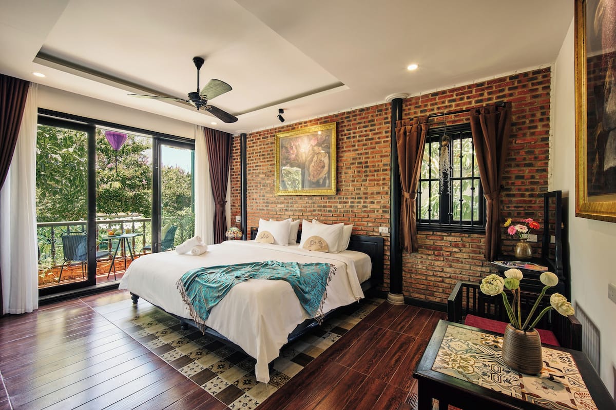 Quarto premier, 1 cama King, sacada, vista para a cidade | Vista do quarto