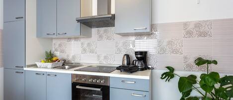 Réfrigérateur, four, lave-vaisselle, grille-pain