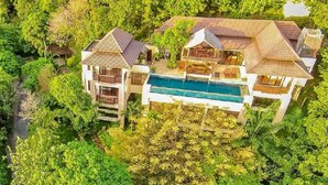 A large, multi-story resort with a swimming pool, surrounded by lush greenery. - Private Pool Villa · Kantiang Bay Sea Views · Koh Lanta (Koh Lanta)