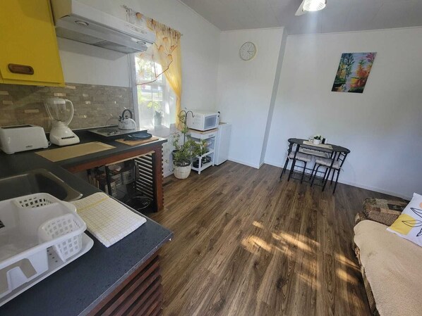 Fridge, microwave, stovetop, coffee/tea maker