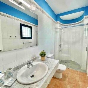 Hair dryer, towels, soap, toilet paper