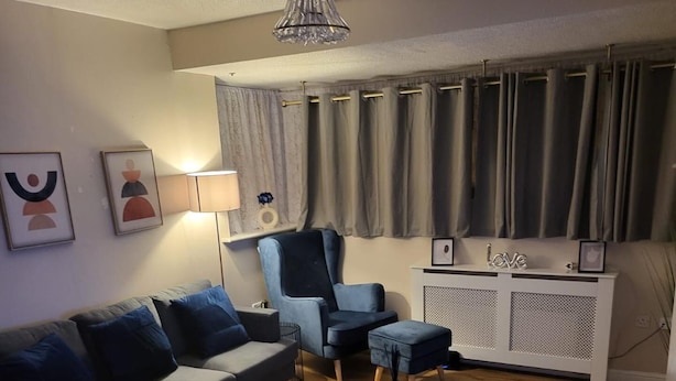 Appartement, 2 grands lits | Aire de séjour