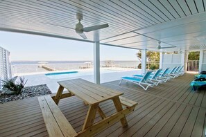 Outdoor dining - Top Shelf - Sound-front, pool, boat lift (Emerald Isle)