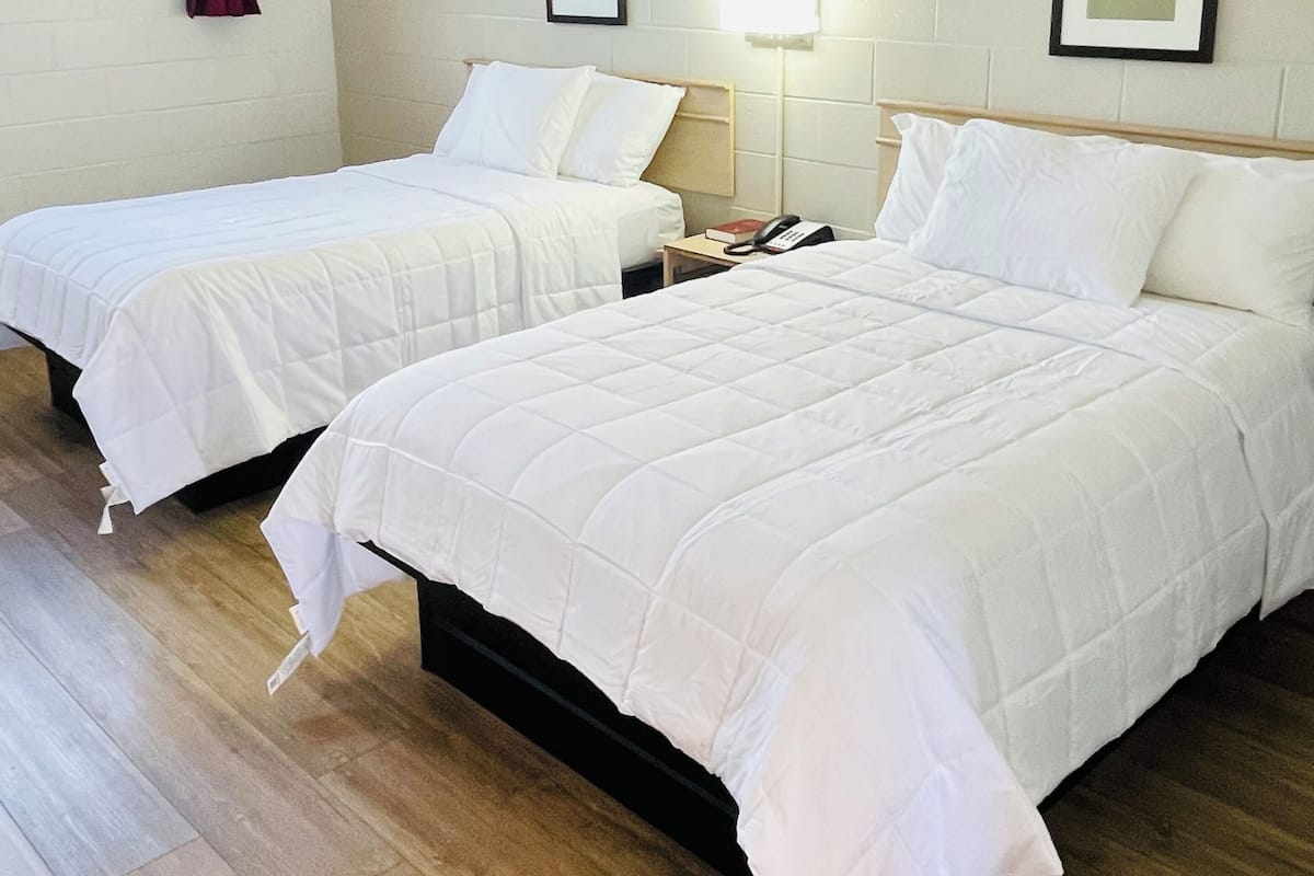 Desk, laptop workspace, free WiFi, bed sheets