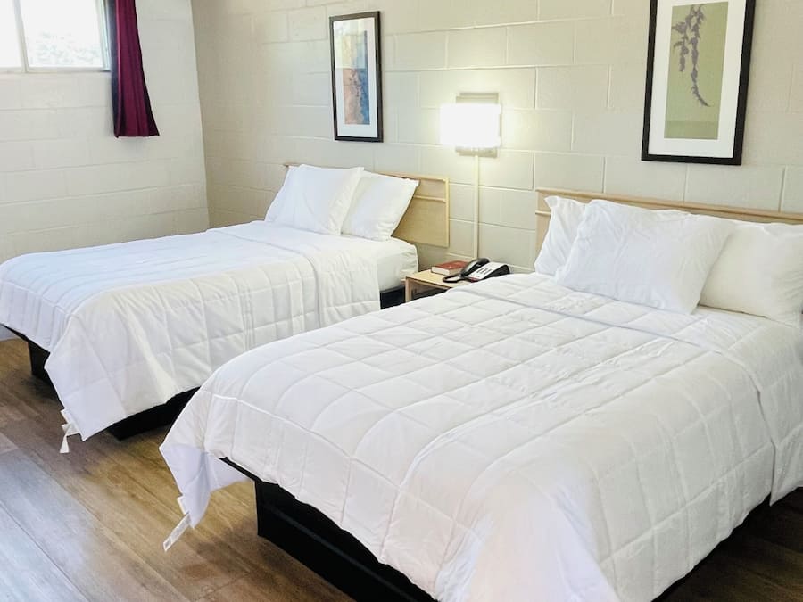 Desk, laptop workspace, free WiFi, bed sheets