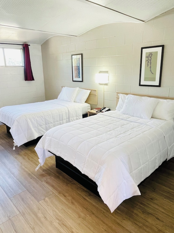 Desk, laptop workspace, free WiFi, bed sheets