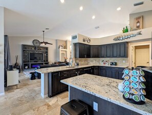 Fridge, microwave, oven, stovetop - Luxury south facing waterfront home with heated salt pool and spa! (Cape Coral)