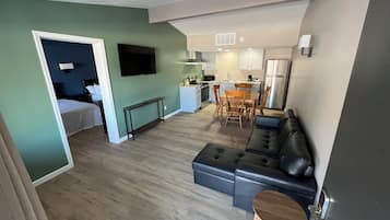 Suite Signature, 1 chambre, coin cuisine | Coin séjour