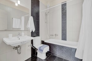 Shower, hair dryer, towels