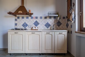 Fridge, stovetop, coffee/tea maker, toaster