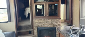Cozy RV tucked back in a quiet property with plenty of room to relax