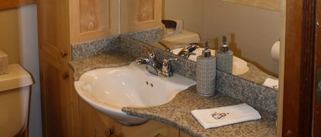 Shower, towels, soap, toilet paper