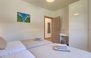 2 室のベッドルーム、旅行用ベビーベッド、WiFi (無料)、ベッドシーツ