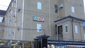 A multi-story building with a sign reading "SIDIA". - gentle tower hotels (Lagos)