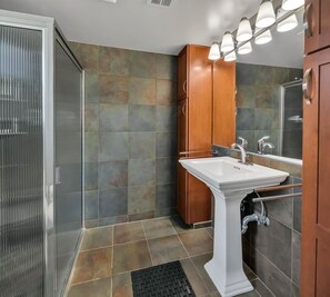Shower, hair dryer, towels, soap