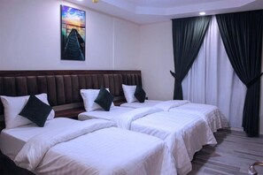 Premium bedding, in-room safe, individually furnished, blackout drapes