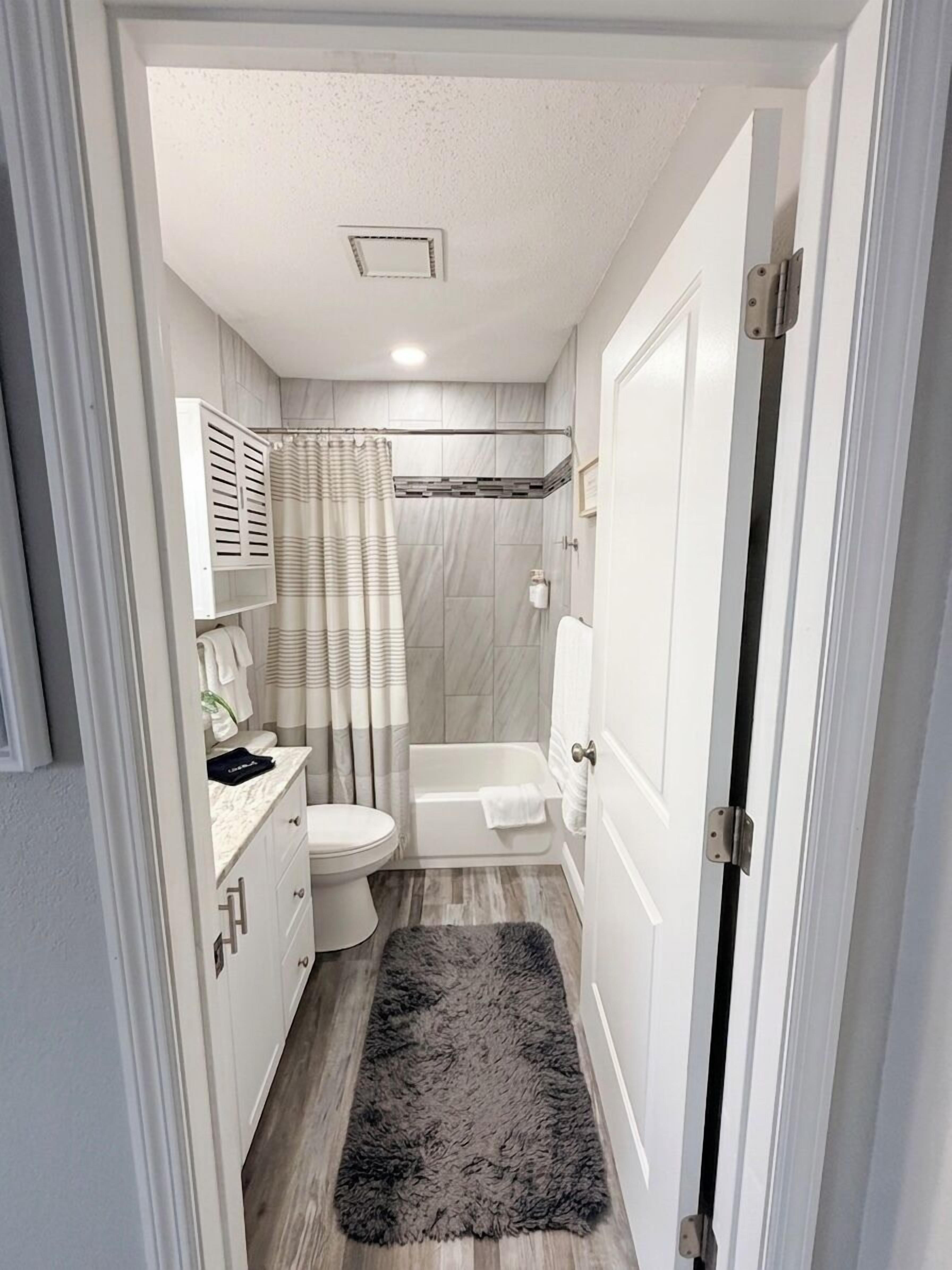 Shower, hair dryer, towels
