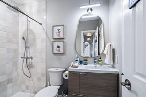 Shower, hair dryer, towels