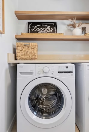 Pool towels and travel clothes get an easy reset here, keeping mid-stay cleanup from turning into a chore during longer visits.
