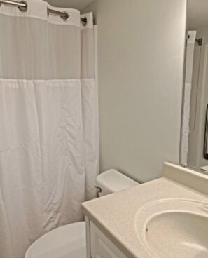 Hair dryer, towels, soap, toilet paper