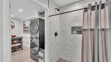 Hair dryer, towels, soap, shampoo