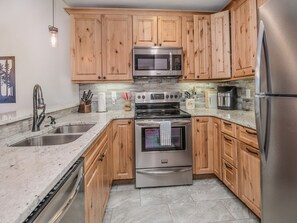 Fridge, microwave, oven, stovetop - Pitkin Creek Park 3F | Updated 4BR Condo in East Vail on Bus Route (Vail)