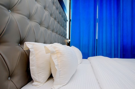 Grand Room, 1 King Bed | 2 bedrooms, minibar, in-room safe, individually furnished