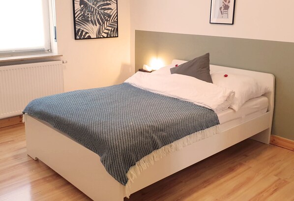 1 bedroom, desk, iron/ironing board, travel crib