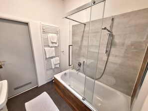 Hair dryer, towels, soap, shampoo